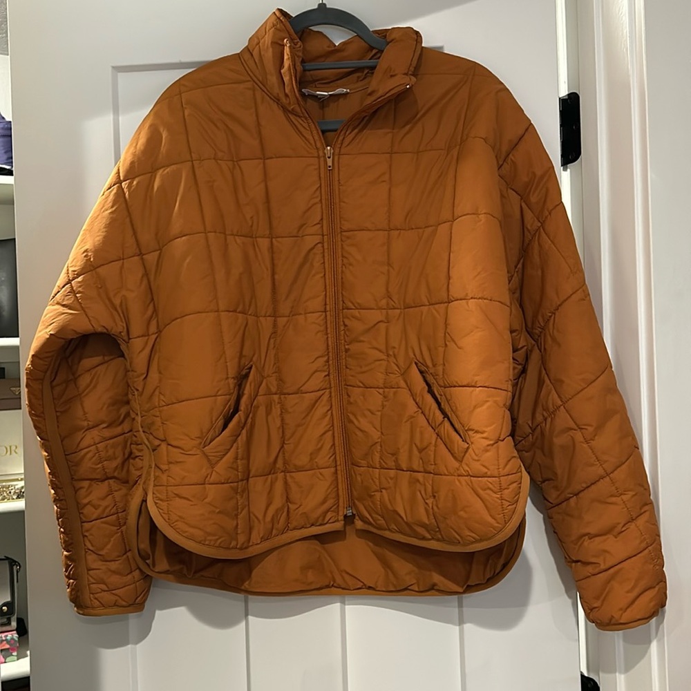 Orange puffer jacket